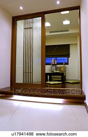 Modern room view from open sliding door View Large Photo Image Stock Photo - Modern room view from open sliding door. Fotosearch