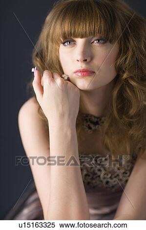 Stock Photography - Studio shot of gorgeous teenage girl. Fotosearch