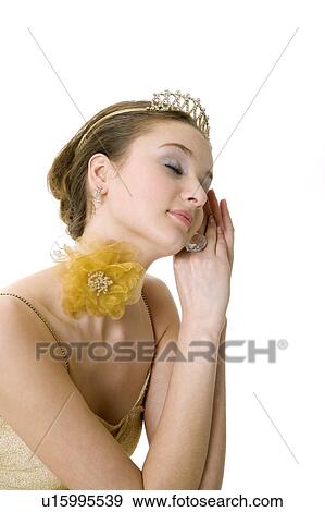Studio shot of teenage girl making sleeping pose View Large Photo Image Stock Photo - Studio shot of teenage girl making sleeping pose. Fotosearch