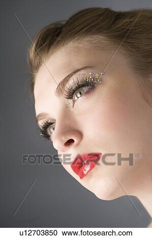 Studio shot of teenage girl with makeup View Large Photo Image Stock Image - Studio shot of teenage girl with makeup. Fotosearch