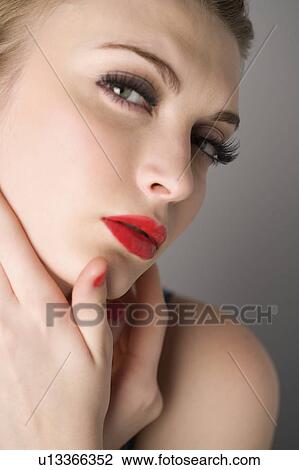 Studio shot of teenage girl with makeup View Large Photo Image Stock Image - Studio shot of teenage girl with makeup. Fotosearch
