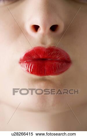 Studio shot of teenage girl with puckered lips View Large Photo Image Stock Photography - Studio shot of teenage girl with puckered lips. Fotosearch