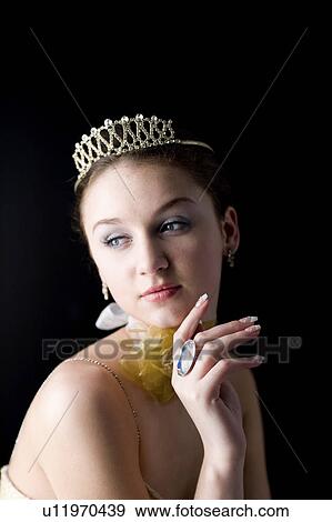 Stock Photo - Teenage girl wearing crown. Fotosearch