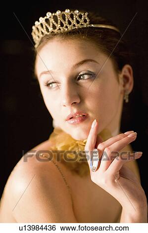 Teenage girl wearing crown View Large Photo Image Stock Photograph - Teenage girl wearing crown. Fotosearch
