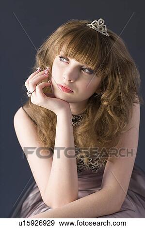 Teenage girl wearing formal dress View Large Photo Image Stock Photo - Teenage girl wearing formal dress. Fotosearch