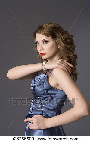 Stock Photo - Teenage girl wearing formal dress. Fotosearch