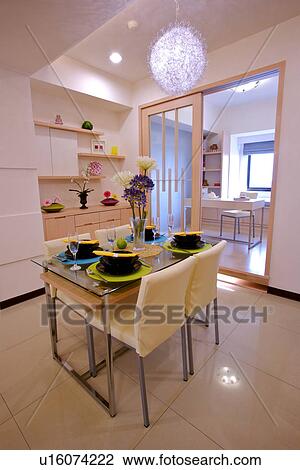 Stock Image - Dinning table in contemporary house. Fotosearch