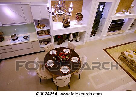 Picture - Elevated view of modern dinning table in contemporary house, Indoors,, Horizontal,. Fotosearch