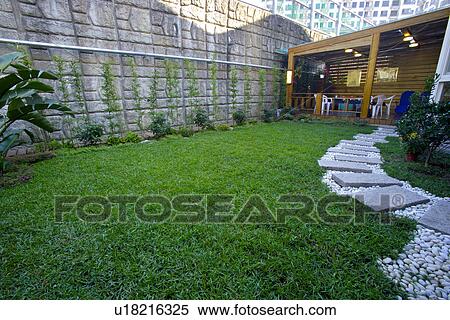 Stock Photography - Front yard and patio. Fotosearch