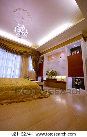 Stock Image - Large modern style bedroom. Fotosearch