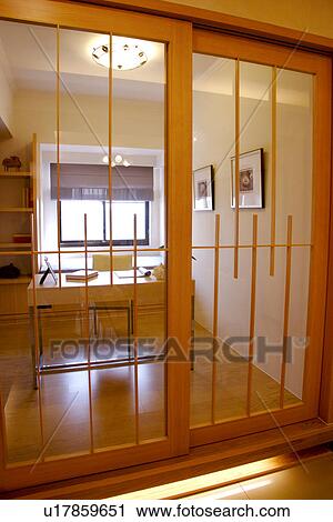 Stock Image - Study, view through sliding door. Fotosearch