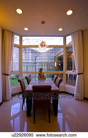 Stock Photography - Table and chairs in modern room. Fotosearch