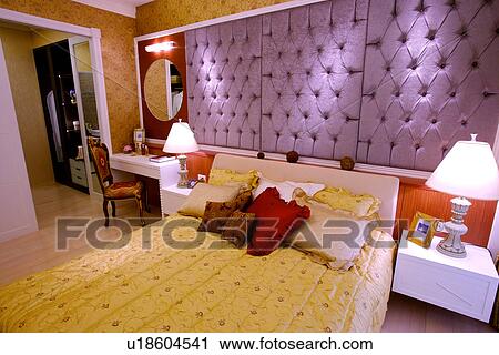 Stock Image - View of a contemporary bedroom. Fotosearch