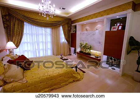 Stock Image - View of a contemporary bedroom. Fotosearch