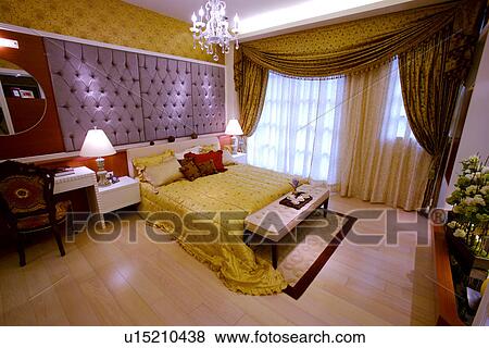 Stock Photo - View of a contemporary bedroom. Fotosearch