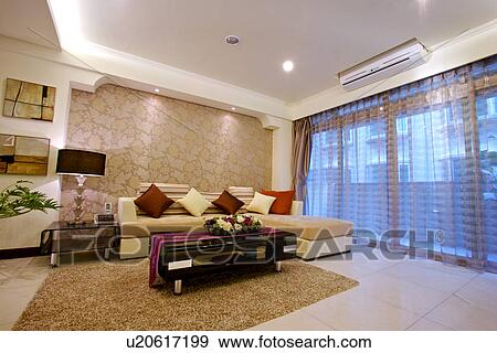 View of a contemporary living room View Large Photo Image Stock Photo - View of a contemporary living room. Fotosearch