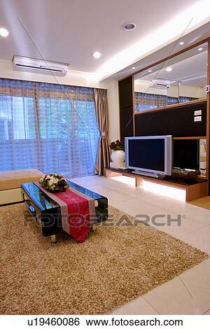 Stock Photograph - View of a contemporary living room. Fotosearch