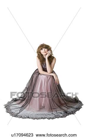 Stock Image - Studio shot of teenage girl, portrait, close up. Fotosearch