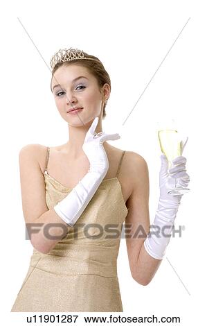 Teenage girl holding a glass of beer View Large Photo Image Stock Photo - Teenage girl holding a glass of beer. Fotosearch