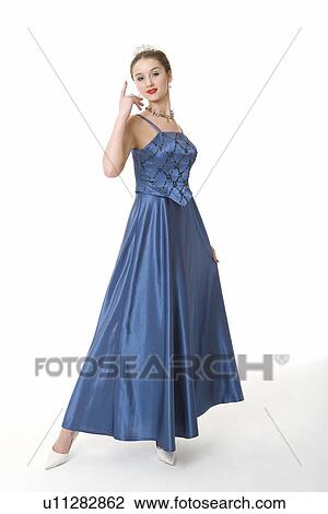 Stock Image - Teenage girl in evening gown. Fotosearch