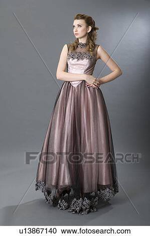Stock Image - Teenage girl in formal dress. Fotosearch