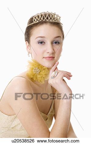 Teenage girl wearing crown, portrait View Large Photo Image Stock Photograph - Teenage girl wearing crown, portrait. Fotosearch