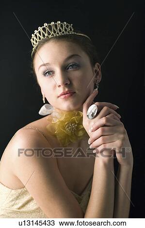 Teenage girl wearing crown View Large Photo Image Stock Image - Teenage girl wearing crown. Fotosearch