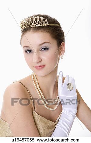 Stock Photography - Teenage girl wearing jewelries. Fotosearch