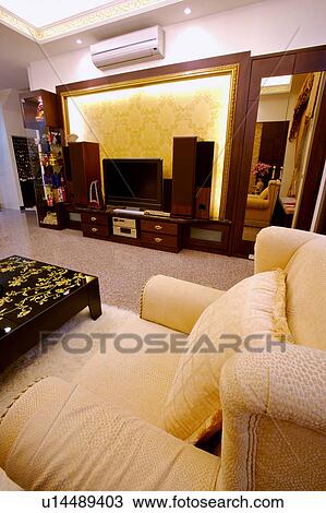 Stock Image - Cosy and furnished living room. Fotosearch
