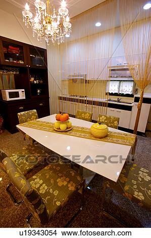 Dinning room, kitchen behind curtain View Large Photo Image Picture - Dinning room, kitchen behind curtain. Fotosearch