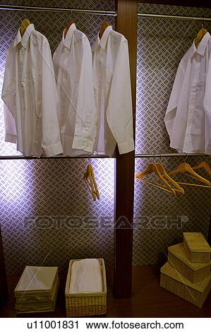 Wardrobe with shirts View Large Photo Image Stock Image - Wardrobe with shirts. Fotosearch