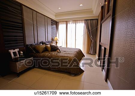 Stock Photo - Home interior of bedroom with modern style. Fotosearch