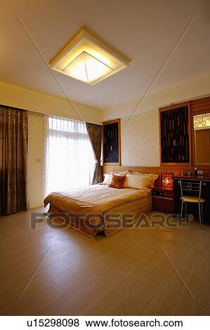 Stock Photo - Home interior of bedroom with modern style. Fotosearch