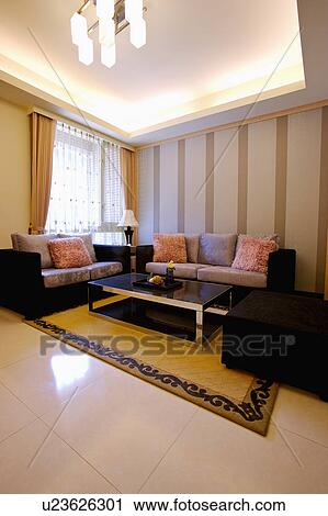 Stock Image - Showcase interior of living room with modern style. Fotosearch