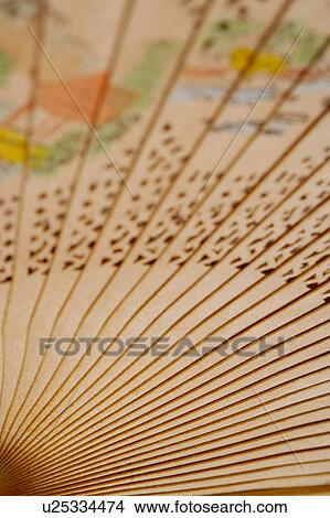Chinese fan made of wood, close-up View Large Photo Image Picture - Chinese fan made of wood, close-up. Fotosearch