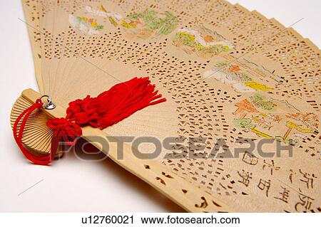 Stock Image - Chinese fan made of wood. Fotosearch