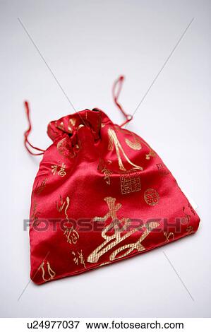 Red embroidered Chinese silk bag View Large Photo Image Stock Photo - Red embroidered Chinese silk bag. Fotosearch