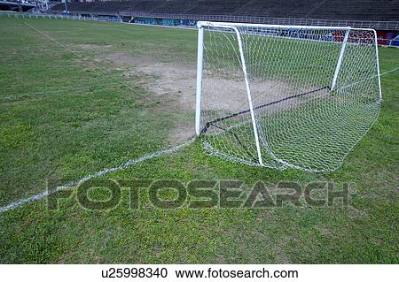 Stock Image - Goal Net on a Football Pitch. Fotosearch