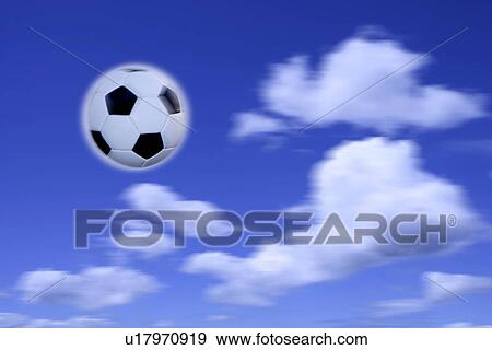 Soccer ball in mid air View Large Photo Image Stock Photo - Soccer ball in mid air. Fotosearch