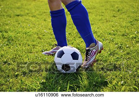 Soccer player with ball, mid section View Large Photo Image Stock Photograph - Soccer player with ball, mid section. Fotosearch