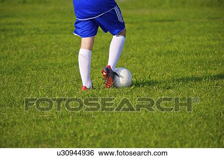 Soccer player with ball, mid section View Large Photo Image Stock Photograph - Soccer player with ball, mid section. Fotosearch