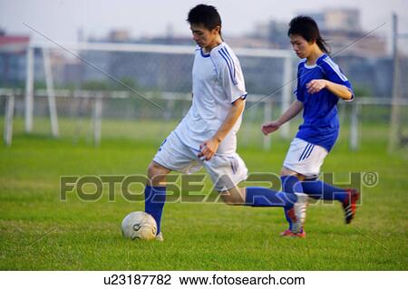 Stock Image - Soccer players. Fotosearch