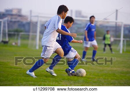 Stock Photo - Soccer players. Fotosearch