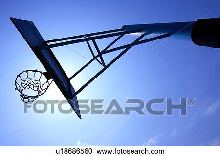 Basketball hoop outdoors, low angle view View Large Photo Image Stock Image - Basketball hoop outdoors, low angle view. Fotosearch