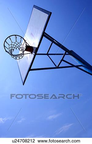 Basketball hoop outdoors, low angle view View Large Photo Image Stock Image - Basketball hoop outdoors, low angle view. Fotosearch