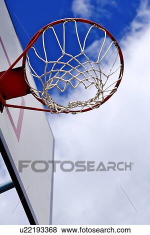 Basketball hoop outdoors, low angle view View Large Photo Image Stock Photo - Basketball hoop outdoors, low angle view. Fotosearch