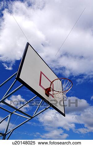 Basketball hoop outdoors, low angle view View Large Photo Image Stock Photography - Basketball hoop outdoors, low angle view. Fotosearch