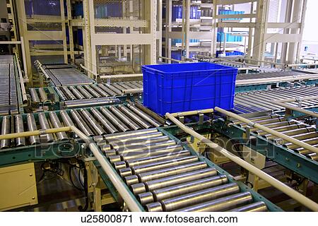 Blue plastic box on conveyor belt View Large Photo Image Stock Image - Blue plastic box on conveyor belt. Fotosearch