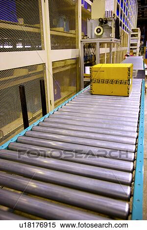 Box on conveyor belt View Large Photo Image Stock Photography - Box on conveyor belt. Fotosearch
