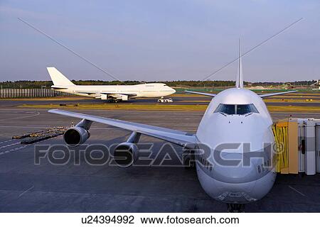 Stock Image - Cargo airplane at airport. Fotosearch